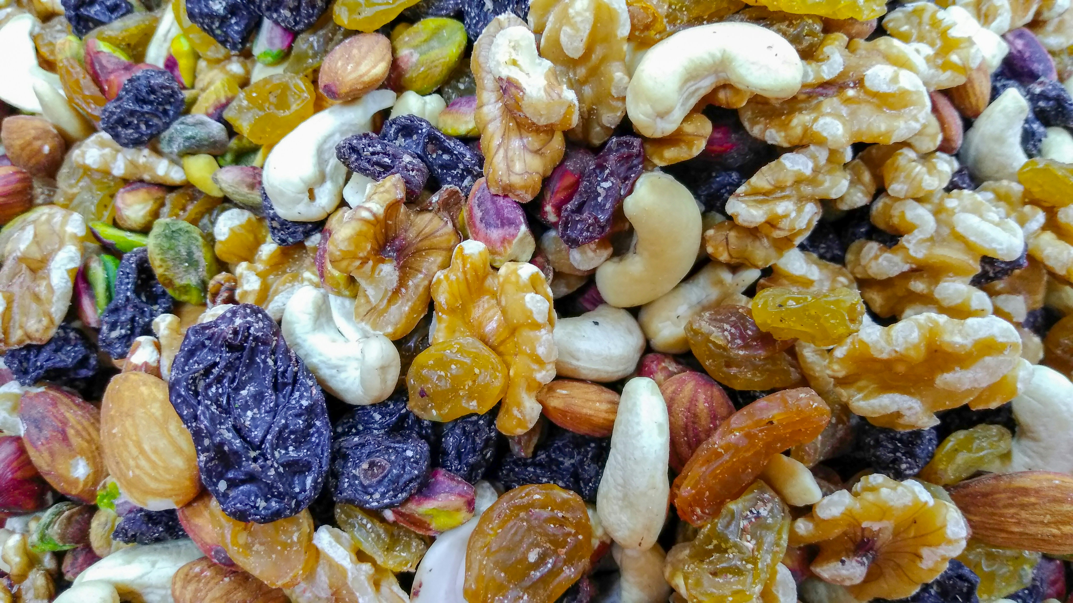 Premium dry fruits and nuts including almonds cashews and raisins at KiranaMart